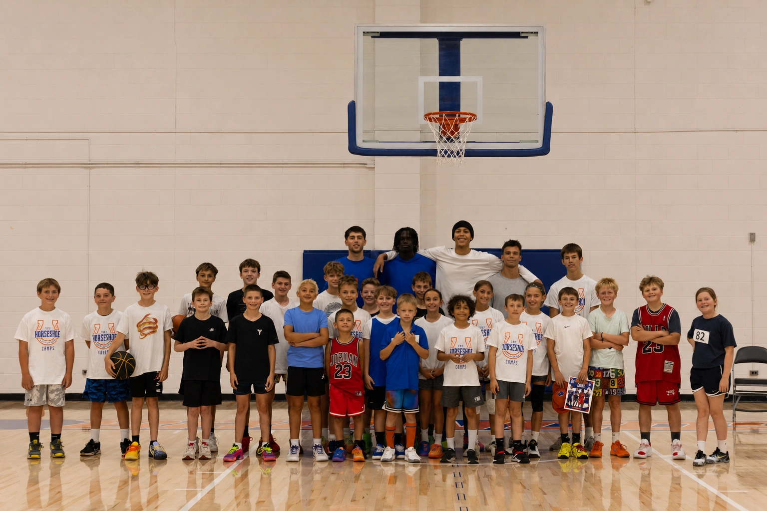 Young camper working through a drill at a past Horseshoe basketball camp