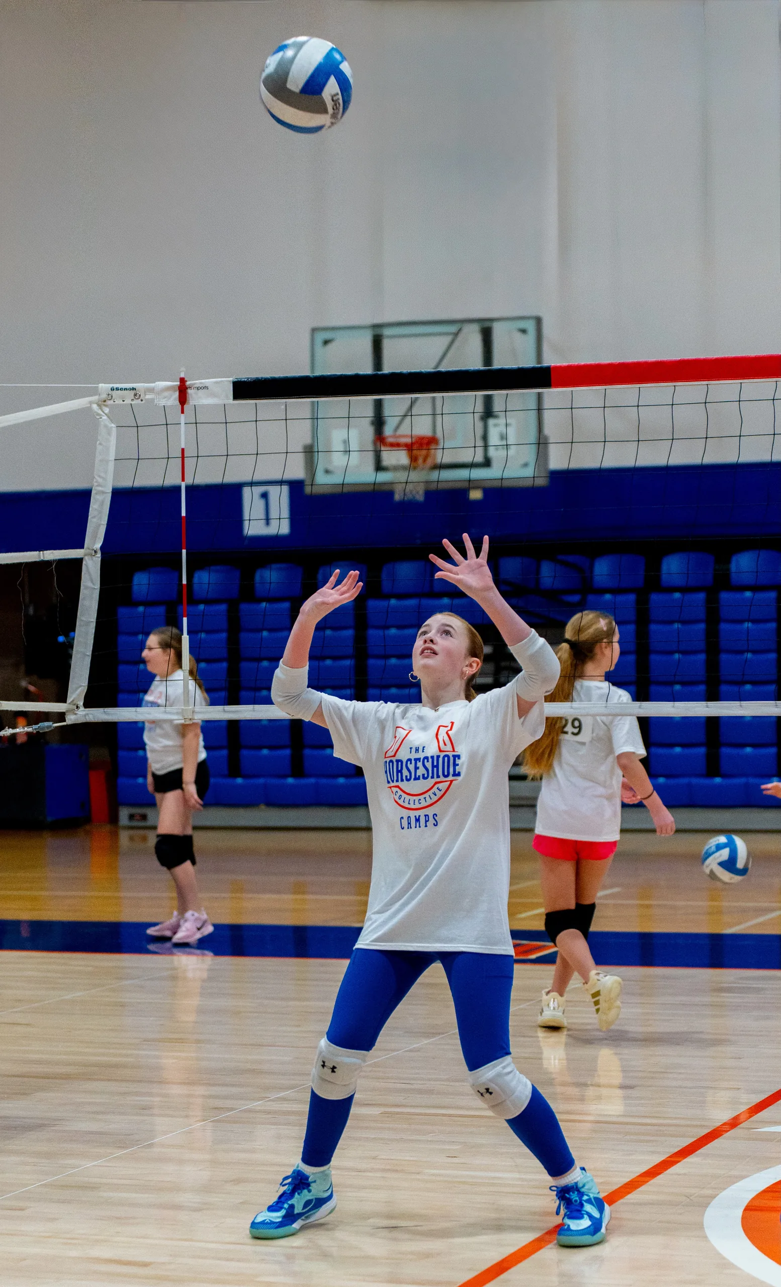 Boise State player at a past Bronco Volleyball clinic