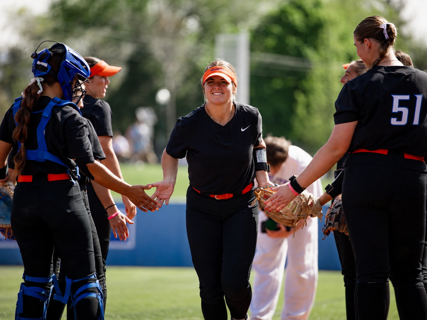 Kate Penberthy of Boise State Softball taking the field with her teammates