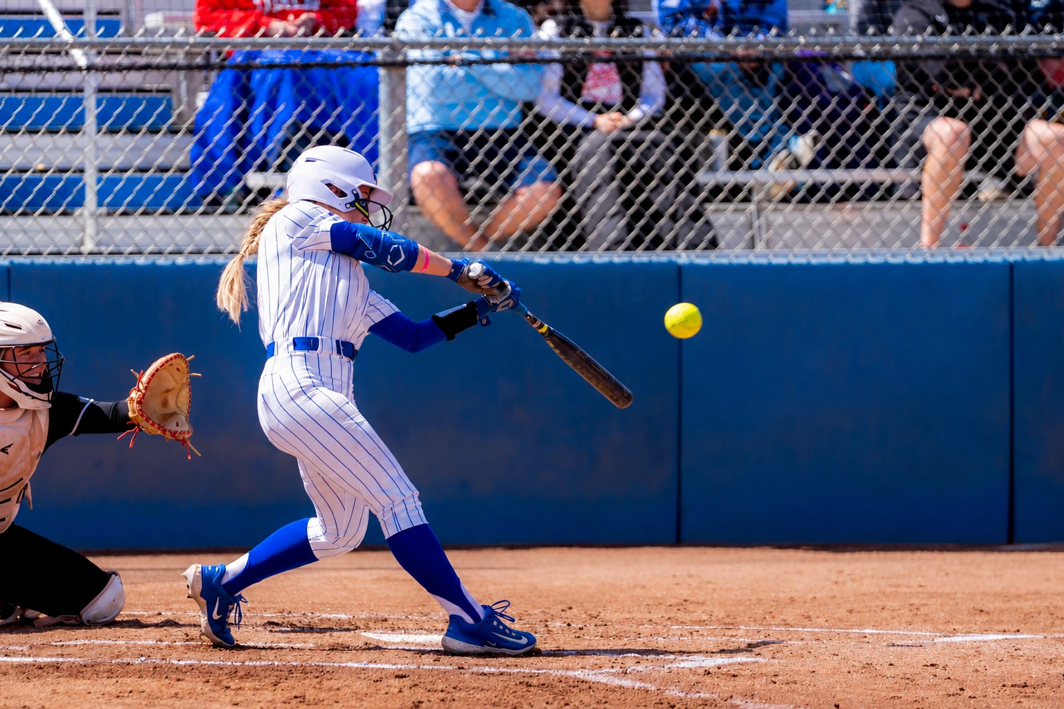Boise State Softball hitter making contact at the plate